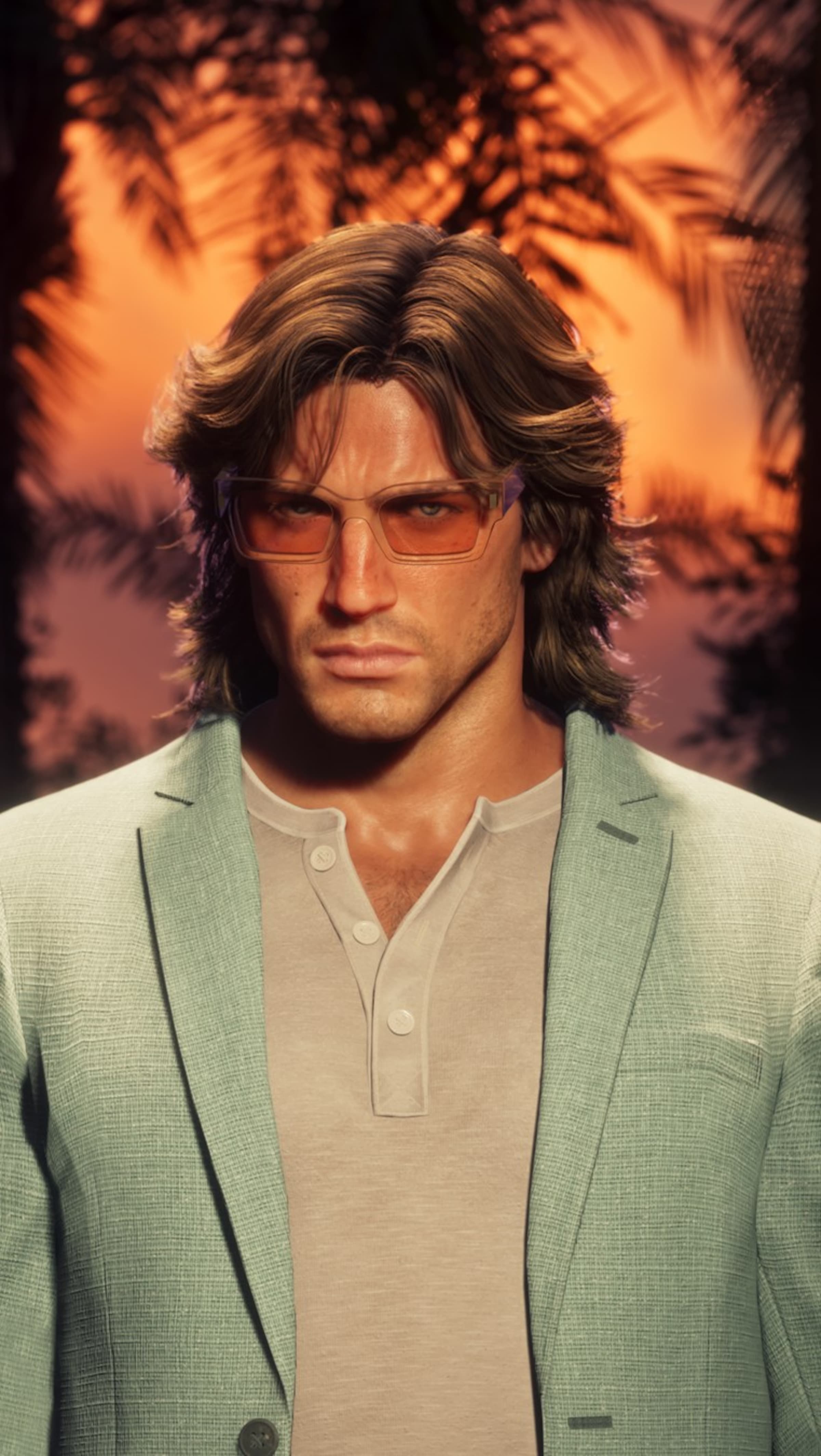 Close portrait of Jason Duval in tinted glasses against a burning orange sunset