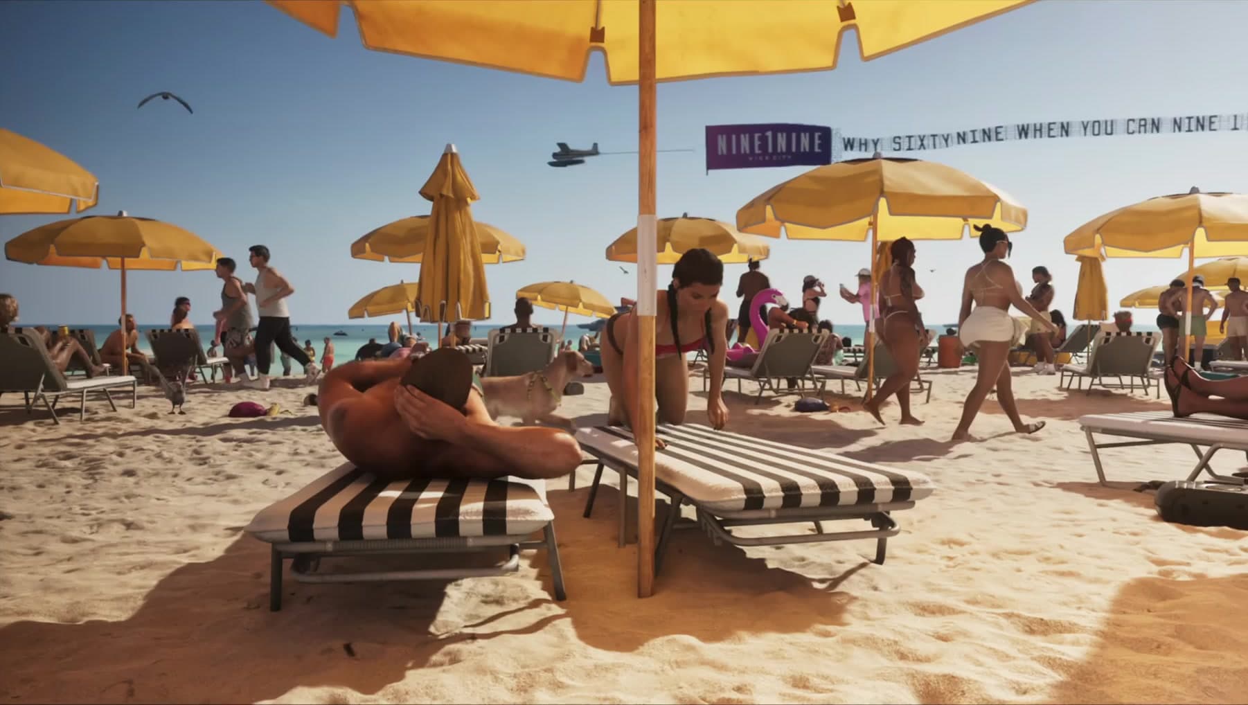 A packed beach as an ad plane tows the NINE1NINE banner overhead